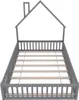 A gray wooden house-shaped bed frame with a slatted base, shown from a slightly elevated front-side angle against a white background. Anteprima dell’immagine prodotto