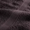 A close-up view of a dark brown towel, showing its texture and woven stripes. Podgląd zdjęcia produktu