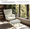 A cozy living room scene with a plush armchair and ottoman by a large window, surrounded by plants and bookshelves. Produktbild-Vorschau