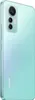 The back of a light green smartphone is shown at an angle. Náhľad obrázku produktu