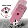 A pink glitter phone case for an iPhone 13 is shown on a cracked concrete surface, with a close-up inset demonstrating its shockproof feature. Anteprima dell’immagine prodotto