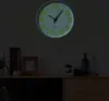 A wall clock with glowing numbers is mounted on a wall above a shelf with decorative items. Voir les images du produit