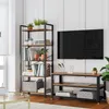 A living room scene featuring a tall bookshelf and a TV stand with a television. Produktbild-Vorschau