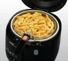 A close-up shot of a black deep fryer filled with French fries, with the lid open. Náhled obrázku produktu