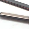 A close-up shot of a hair straightener, showing the plates and casing. Náhľad obrázku produktu