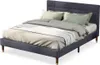 A bed with bedding and pillows, shown against a white background. Produktbild-Vorschau
