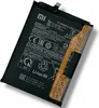 A black battery with orange accents and text labels, isolated on a white background. Produktbild-Vorschau