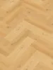 A close-up, overhead view of a herringbone-patterned wooden floor. Produktbild-Vorschau