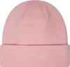 A close-up studio shot of a pink beanie. Náhľad obrázku produktu