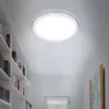 A hallway with bookshelves on the left and a ceiling light fixture. Náhľad obrázku produktu