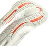 Close-up view of the sole of a white and orange Adidas running shoe. Podgląd zdjęcia produktu