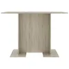 A front view of a light brown wooden dining table with a pedestal base. Podgląd zdjęcia produktu