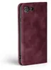 A close-up side view of a burgundy flip phone case for an iPhone. Produktbild-Vorschau