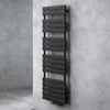 A black radiator is mounted on a textured gray wall. Produktbild-Vorschau