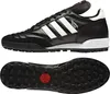 A top-down view and a bottom view of a black Adidas Mundial Team soccer shoe. Podgląd zdjęcia produktu