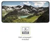 A smartphone screen displaying a mountain landscape, with a graphic icon and text below indicating a matte, anti-reflective screen protector. Produktbild-Vorschau
