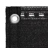 A close-up view of a black balcony privacy screen, showing its woven texture and a metal grommet for attachment. Produktbild-Vorschau