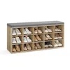 A shoe bench with multiple compartments for shoe storage, topped with a gray upholstered seat. Produktbild-Vorschau