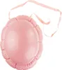 A pink, round, inflatable object with a strap, resembling a turtle shell or a large balloon. Produktbild-Vorschau