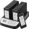 A set of restaurant pagers and their charging base, displayed on a light gray surface. Náhled obrázku produktu