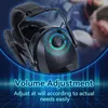 Close-up of a black headset with a glowing blue and green circular graphic highlighting the volume adjustment knob. The background shows blurred figures of people in what appears to be a work or industrial setting. Náhled obrázku produktu