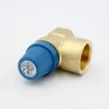 A close-up studio shot of a brass pressure relief valve with a blue adjustment knob. Náhľad obrázku produktu