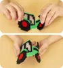 Hands assembling a toy tractor made of small beads. Produktbild-Vorschau