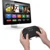 A person is holding a wireless keyboard in front of a computer monitor displaying a media interface. Anteprima dell’immagine prodotto