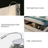 A collage of images showcasing different features of a bed, including a reading light, storage space, and USB charging ports. Náhled obrázku produktu
