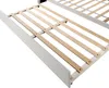Close-up view of a bed frame with wooden slats. Produktbild-Vorschau