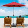 Two people relaxing on lounge chairs on a beach under a red umbrella. Produktbild-Vorschau