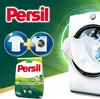 A marketing image for Persil laundry detergent, showing a bag of powder and a washing machine with a clean white t-shirt. Náhľad obrázku produktu