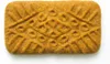 A single biscuit with a patterned surface, isolated on a white background. Produktbild-Vorschau
