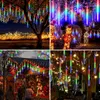 A collage of four images showing colorful LED meteor shower lights used for decoration during holidays and events. Náhled obrázku produktu