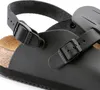 A close-up view of a black Birkenstock sandal strap and buckle. Produktbild-Vorschau