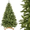 A full shot of a Christmas tree on a white background, with a close-up of its branches on the right. Voir les images du produit