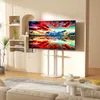 A modern living room with a TV stand holding a large television displaying a vibrant landscape image. The room features minimalist shelves and furniture. Anteprima dell’immagine prodotto