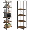 Two tall, narrow shelving units are shown side-by-side against a white background. The unit on the left is filled with kitchenware, including a microwave, pots, bowls, and baskets of eggs and produce. The unit on the right is empty, showing its industrial- Náhled obrázku produktu