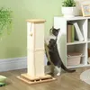 A cat is scratching a cat tree in a room with light green walls and a white shelving unit. Produktbild-Vorschau