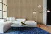 A modern living room with a sectional sofa, coffee table, and a floor lamp. Podgląd zdjęcia produktu