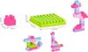 A collage of building blocks and assembled toys, with dimensions indicated. Produktbild-Vorschau