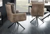 Two modern dining chairs with swivel bases are shown in a room with a large window overlooking a landscape. Produktbild-Vorschau