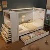 A white canopy bed with built-in shelving and drawers in a bedroom. Produktbild-Vorschau