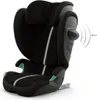 A black child car seat with gray accents and green details, shown from a side-angle. Náhled obrázku produktu