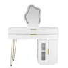 A white vanity table with a cloud-shaped mirror and gold accents, set against a white background. Produktbild-Vorschau