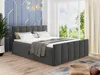 A bedroom with a large bed, window, and decorative wall. Produktbild-Vorschau