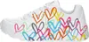 A side view of a white sneaker with a colorful heart print. Voir les images du produit