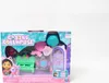 The image shows the packaging of a Gabby's Dollhouse toy set, featuring a piano, a door, and figures. Produktbild-Vorschau