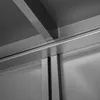 A close-up view of the metallic structure of a storage cabinet, focusing on the sliding door mechanism and support beams. Anteprima dell’immagine prodotto