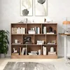 A wooden bookshelf filled with books and decorative items, set against a textured wall. Náhled obrázku produktu